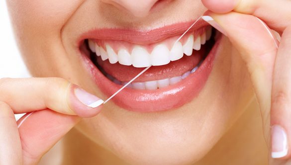 Kako pravilno koristiti zubni konac.